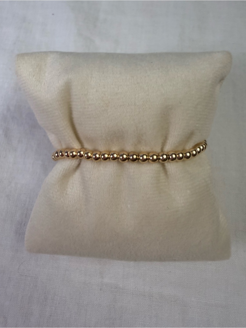 ENewton themed 14k gold filled bead bracelet.